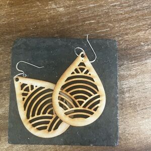 Handmade laser etched wood dangle earrings. Never worn.